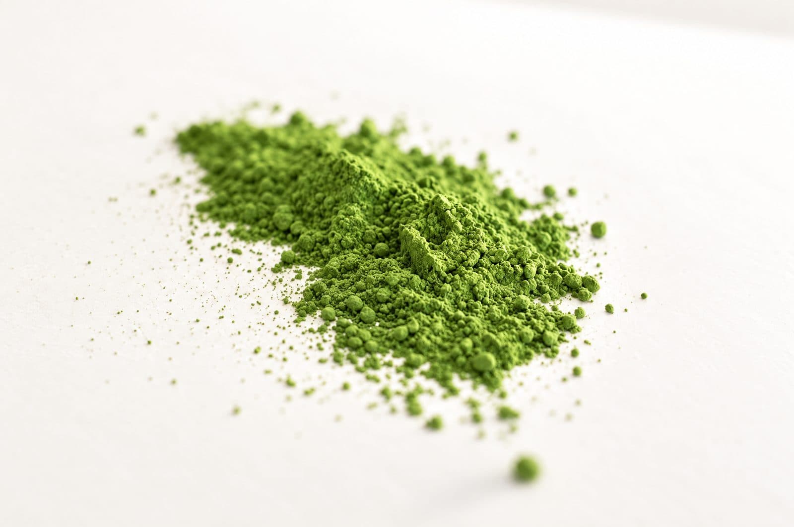 Close-up of vibrant green, freshly ground Matcha Latcha powder